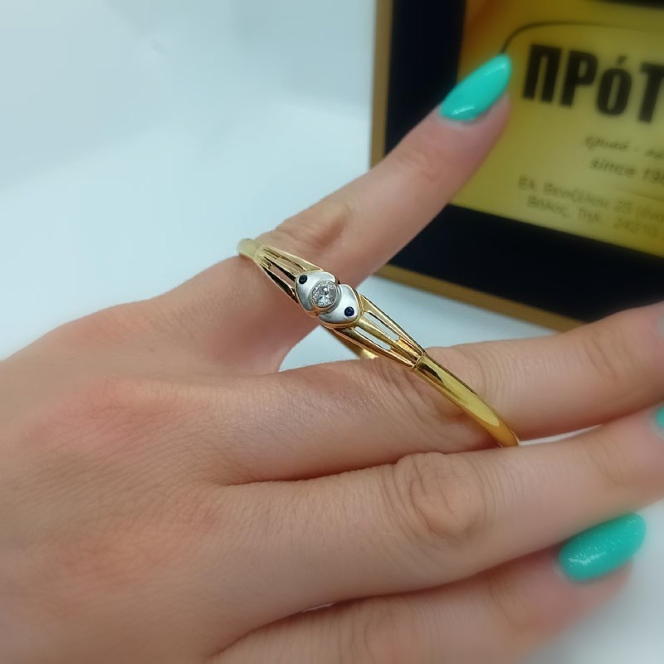 Βραχιόλι χειροπέδα χρυσή Κ14 με ένα ζιργκόν